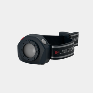 Black LED lenser headlamp on a white background