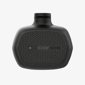Black COROS device on a gray background