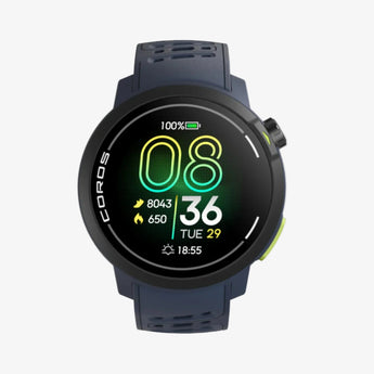 A close-up image of a person's wrist wearing a black Coros Pace Pro GPS Sport Watch with a clear display showing the time and some fitness metrics.