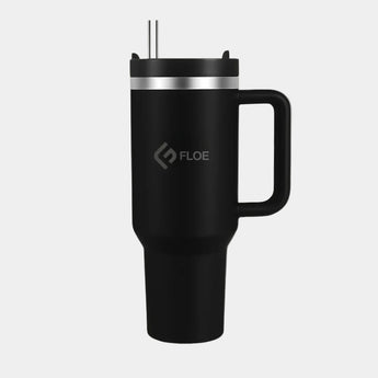 Black insulated mug with handle and straw lid on a white background, featuring the Floe brand.