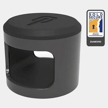 Black cylindrical security device with a visible 'Sold Secure' diamond rating label on a gray background