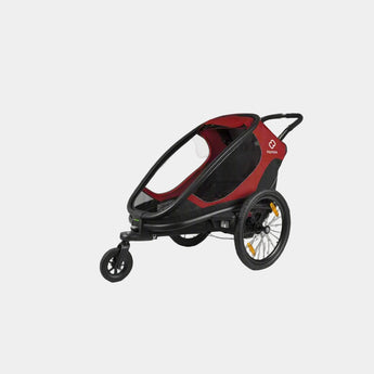 Red and black stroller on a white background