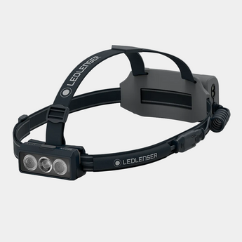Black LEDLENSER headlamp on a white background
