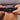 A close-up image of a Polar H10 Heart Rate Monitor being fitted around the chest.