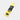 A single Vegen QRO gel energy gel stick in Lemon Drizzle flavor, shown diagonally on a light gray background. The packaging features a black and yellow color scheme with white text.