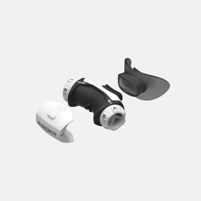 Black and white earbud on a light gray background