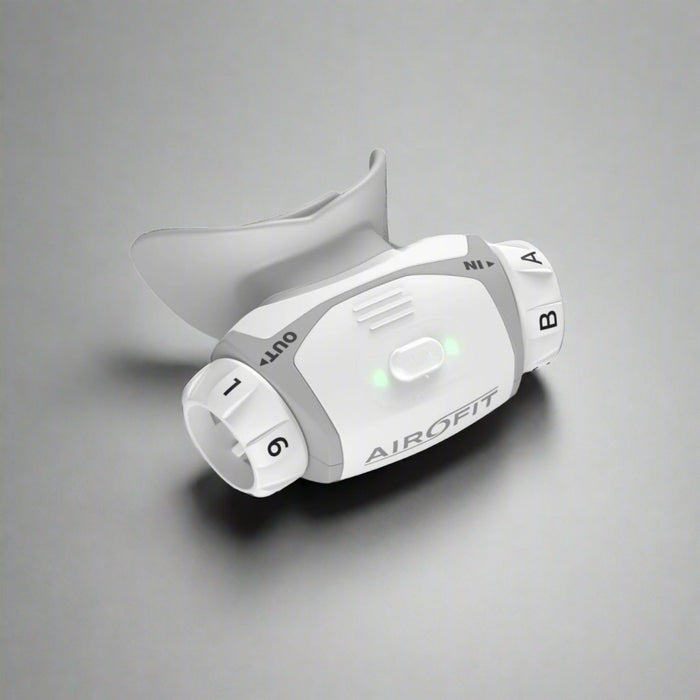 White and gray device labeled 'AIROFIT' on a white background