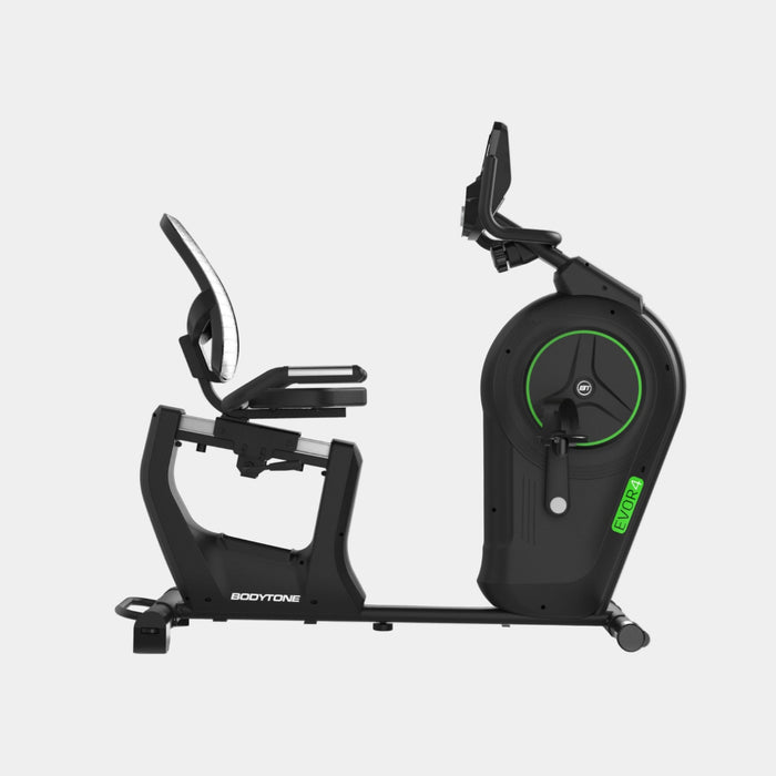 Black exercise bike with green accents on a white background