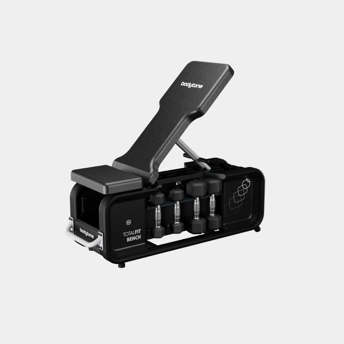 Black and gray weight bench with weights on a white background