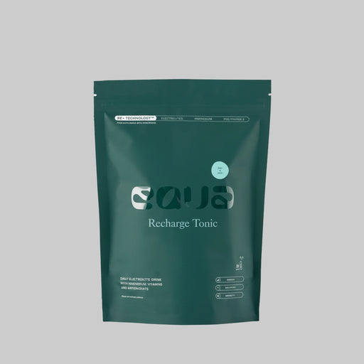 Green package of 'Recharge Tonic' on a white background