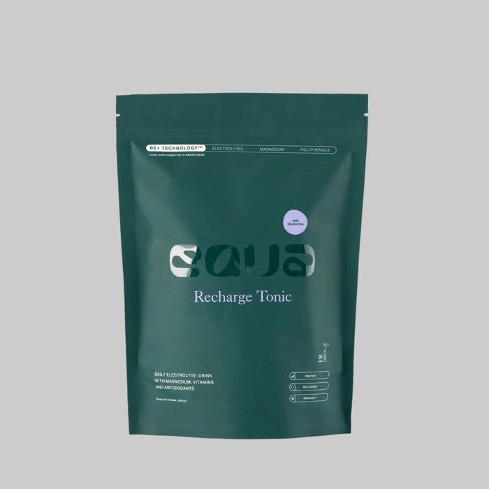 Green package of 'Recharge Tonic' on a white background