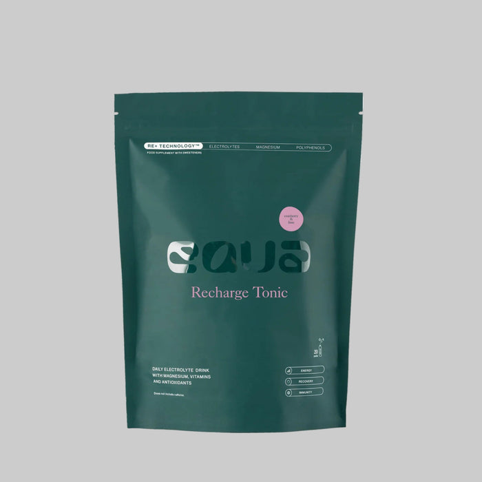 Green package of 'Recharge Tonic' on a white background