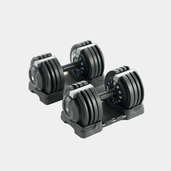 Pair of adjustable dumbbells on a white background