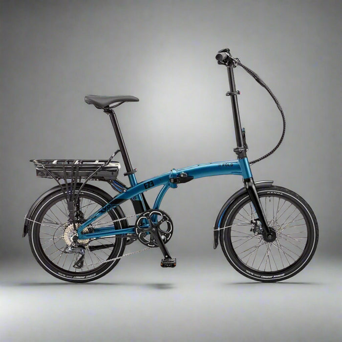 Blue folding bicycle on a cobblestone street with a stone wall background