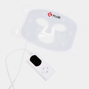 White face mask with control panel on a white background, featuring the 'Floe' brand.