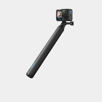 Action camera with a black extendable arm on a gray background