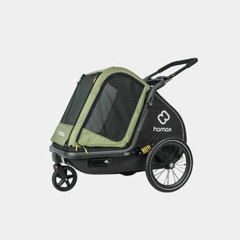 Pet stroller with green canopy and black body on a gray background