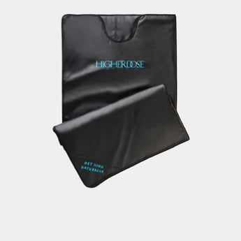 Black blanket with 'Higher Dose' branding on a white background