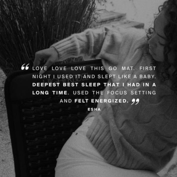 Person sitting on a bench with a quote about a mattress, black and white photo.