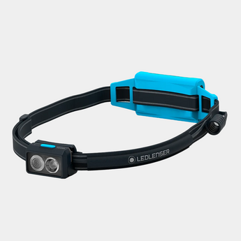 Black and blue LED headlamp with visible brand name on a white background