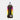 A dark brown collapsible water bottle with a clear cap, featuring a colorful vertical measurement scale in white with purple, orange, yellow, and green blocks.