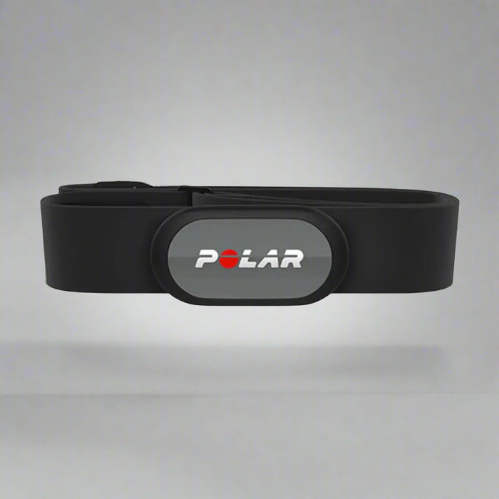Black and gray heart rate monitor with Polar logo on a light gray background