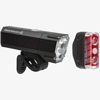 A set of Blackburn brand bike lights with a black front light and red rear light, designed for mounting on a bicycle.
