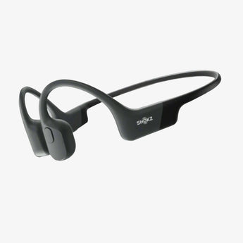 Shokz OpenRun Mini Earphones in black color, featuring a behind-the-neck design with in-ear headphones.